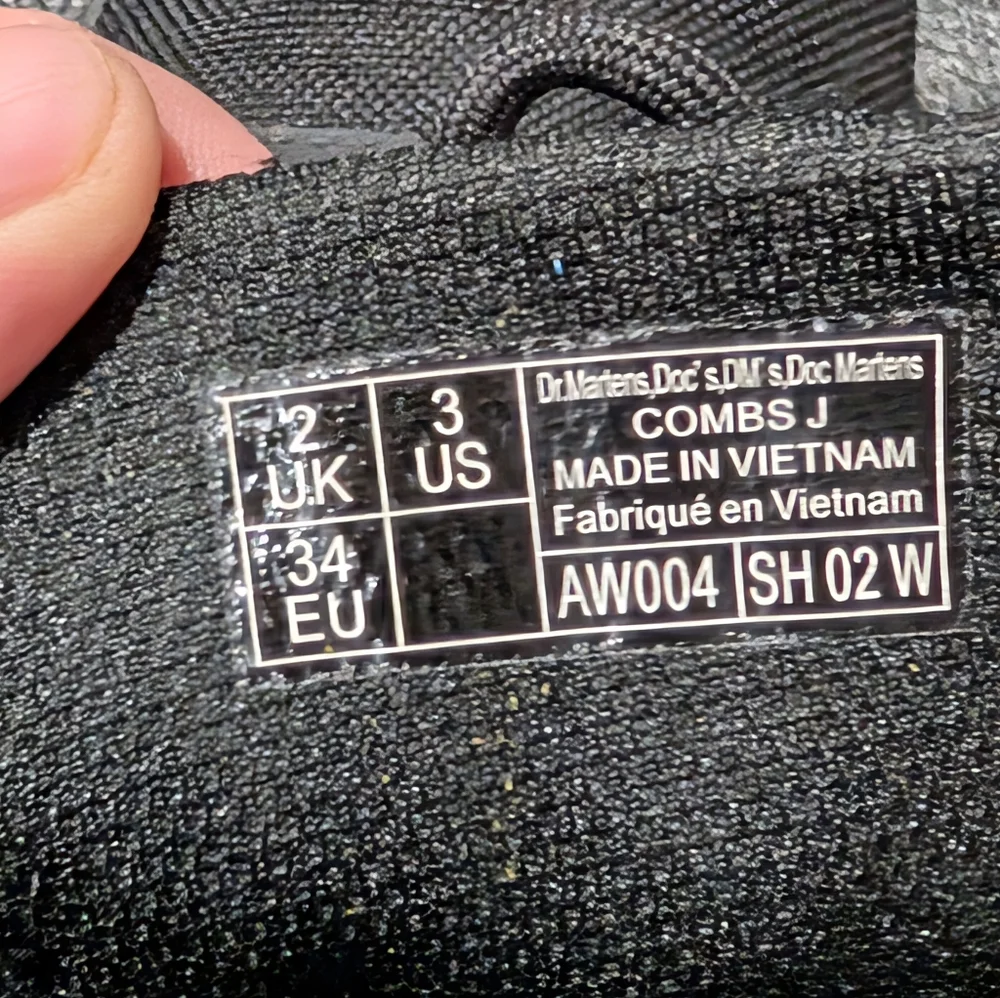 Dr. Martens Black Combat Boots with Yellow Stitching